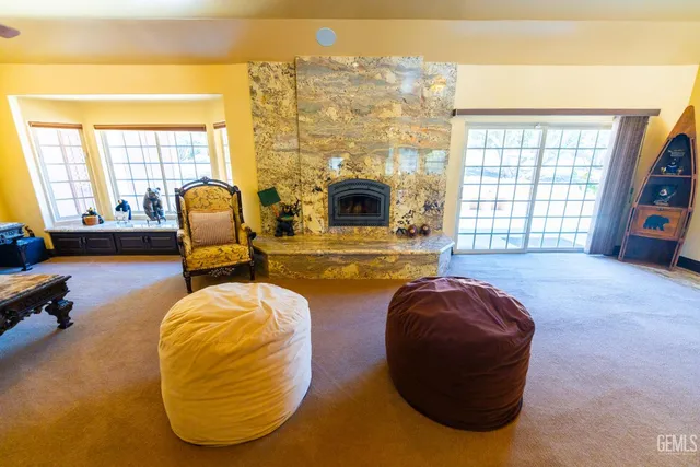 a bed room with a bed and a chandelier