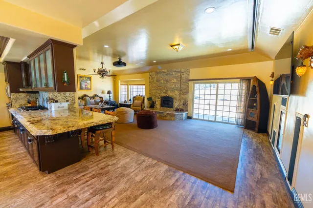 an outdoor sitting area with furniture