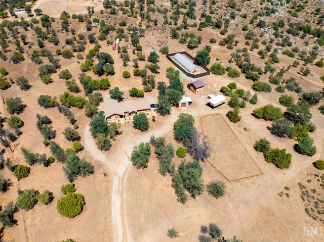 a front view of house with yard outdoor seating and kitchen view