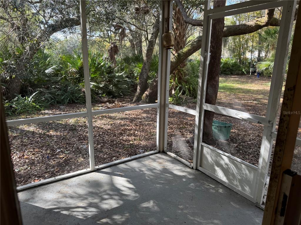 513 Green Spring Circle Winter Springs, FL 32708 - Photo 11 of 12 a view of a yard with wooden fence