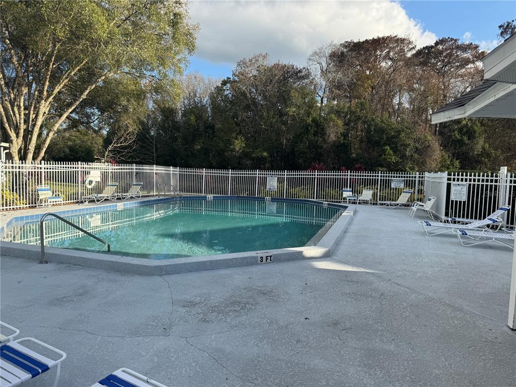 513 Green Spring Circle Winter Springs, FL 32708 - Photo 12 of 12 a view of outdoor space with swimming pool