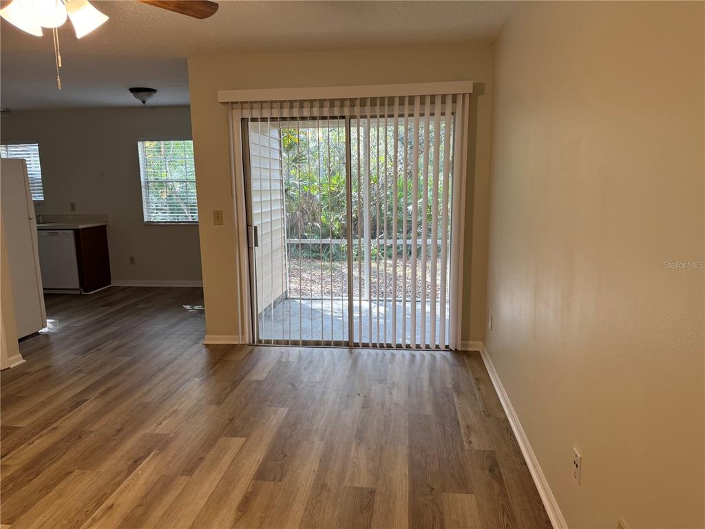 513 Green Spring Circle Winter Springs, FL 32708 - Photo 5 of 12 a view of a room with wooden floor and window
