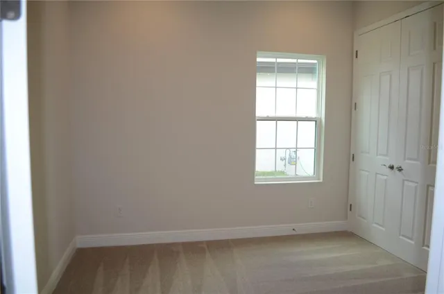 an empty room with a window