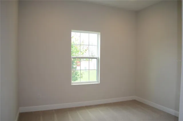 an empty room with a window