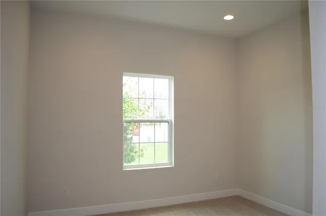 an empty room with a window