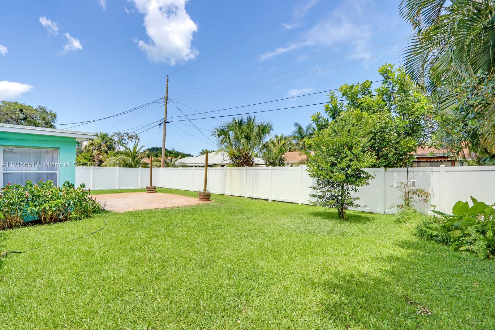1515 Seabrook Road Jupiter, FL 33469 - Photo 26 of 29 a view of a backyard with a garden