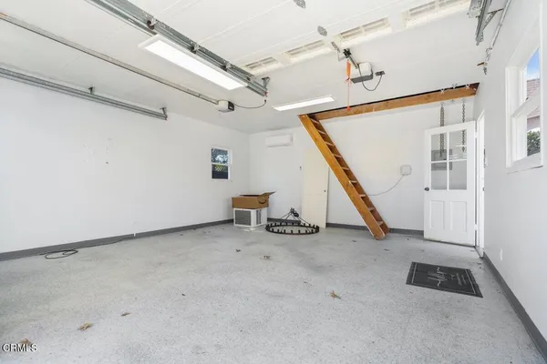 a view of an empty room with stairs