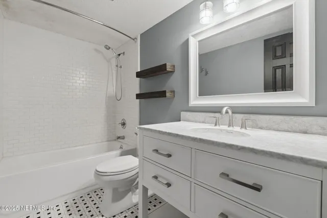 a view of house with swimming pool and porch