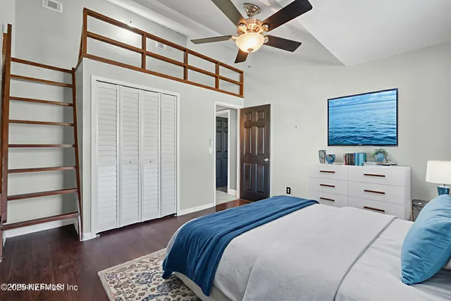 a view of a swimming pool with an outdoor space and seating area