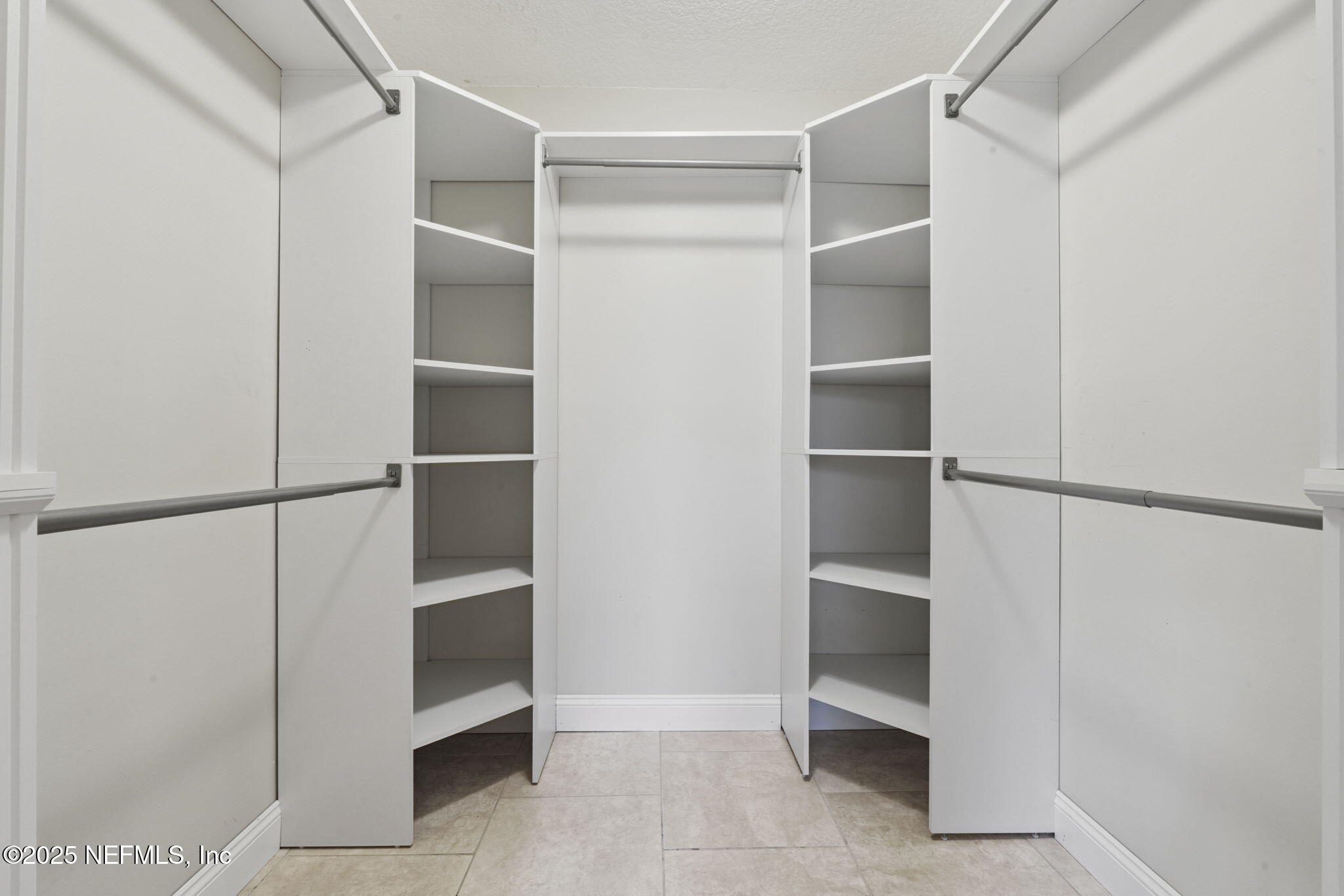 2822 Circle Ridge Drive Orange Park, FL 32065 - Photo 24 of 41 a view of an empty walk in closet