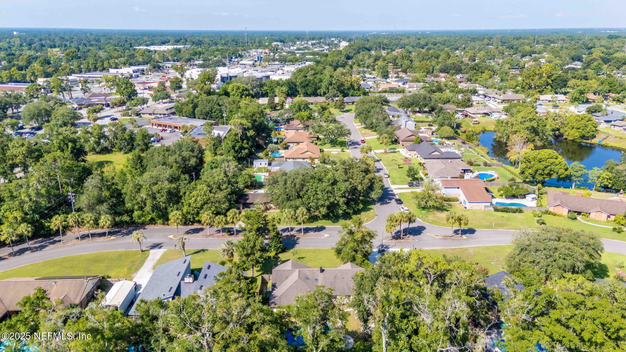 2822 Circle Ridge Drive Orange Park, FL 32065 - Photo 37 of 41 an aerial view of residential houses with outdoor space and swimming pool