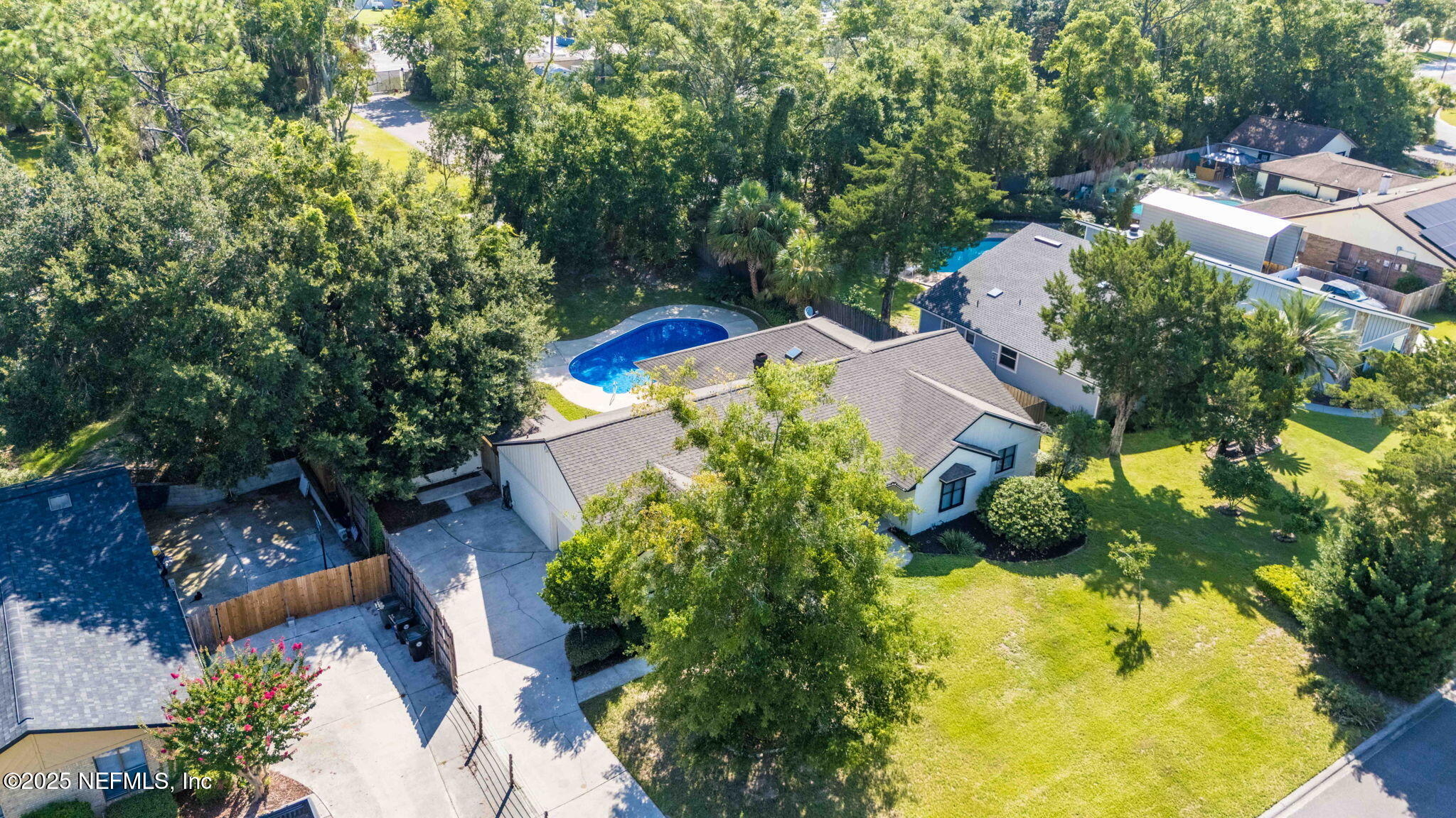 2822 Circle Ridge Drive Orange Park, FL 32065 - Photo 39 of 41 an aerial view of a house with swimming pool and garden