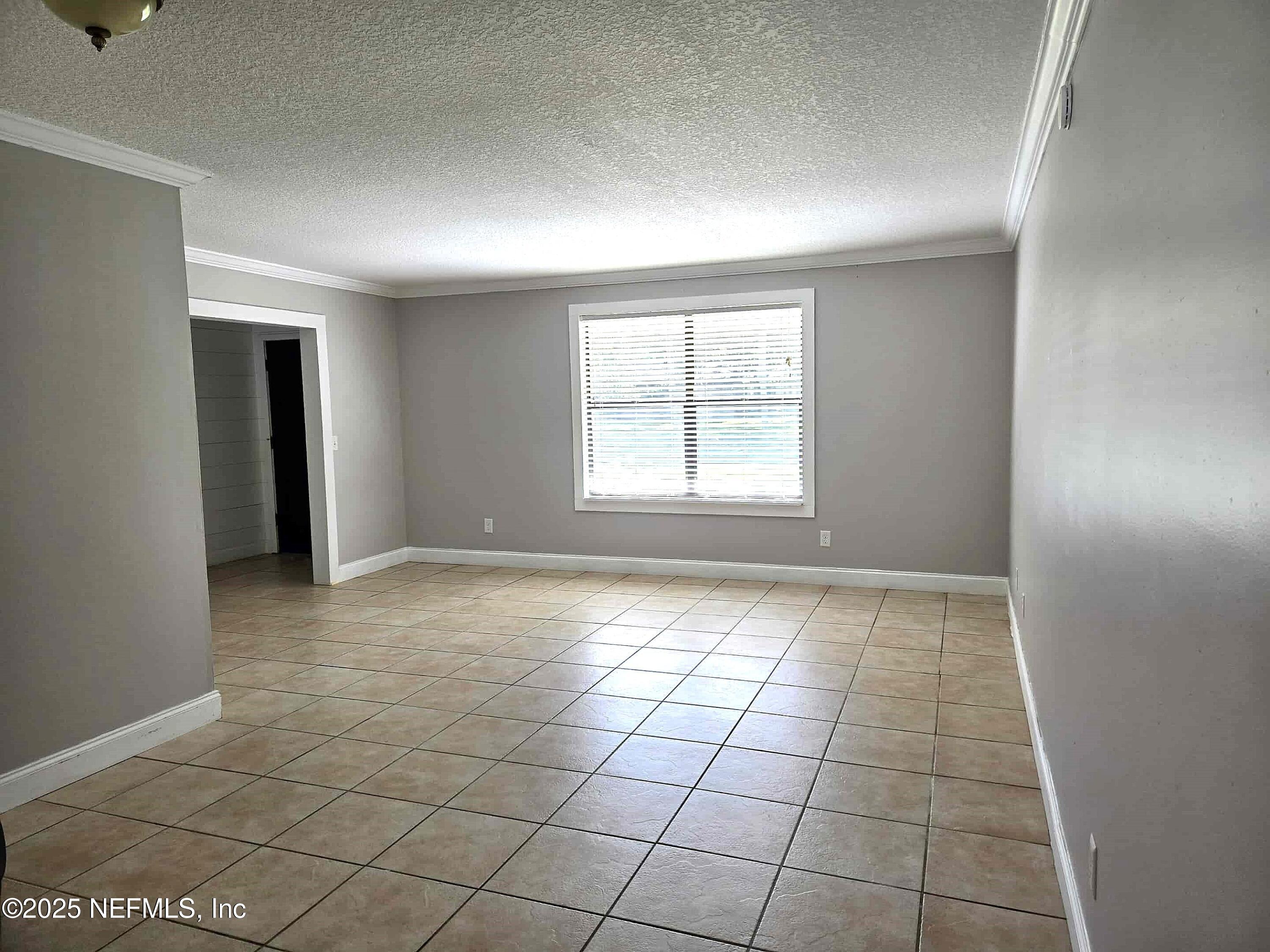 2822 Circle Ridge Drive Orange Park, FL 32065 - Photo 4 of 41 an empty room with windows