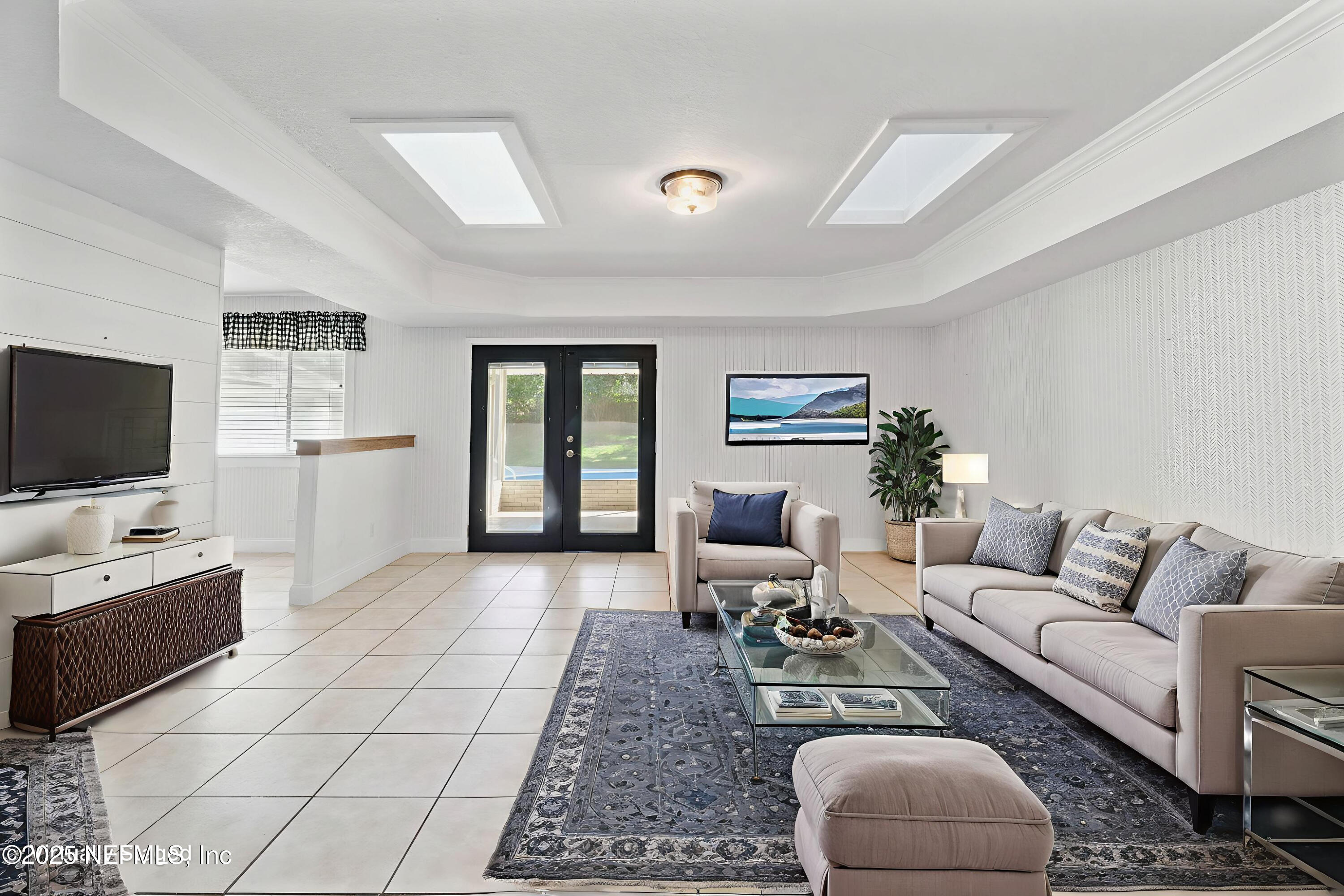 2822 Circle Ridge Drive Orange Park, FL 32065 - Photo 6 of 41 a living room with furniture and a flat screen tv