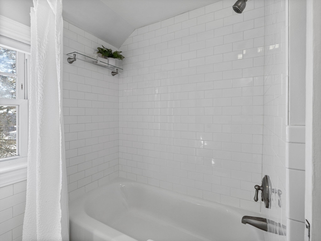 40 Chisholm Road Boston, MA 02131 - Photo 19 of 33 a close up of a bathtub