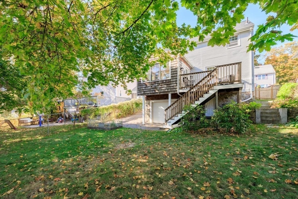 40 Chisholm Road Boston, MA 02131 - Photo 23 of 33 a view of a house with a yard