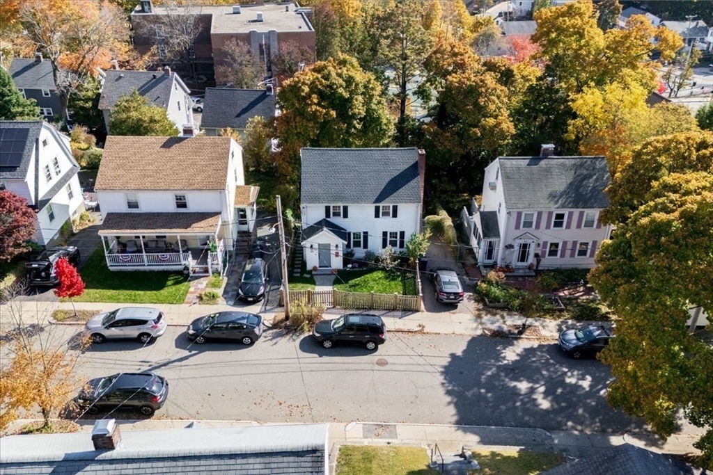 40 Chisholm Road Boston, MA 02131 - Photo 27 of 33 a view of multiple houses with yard and swimming pool
