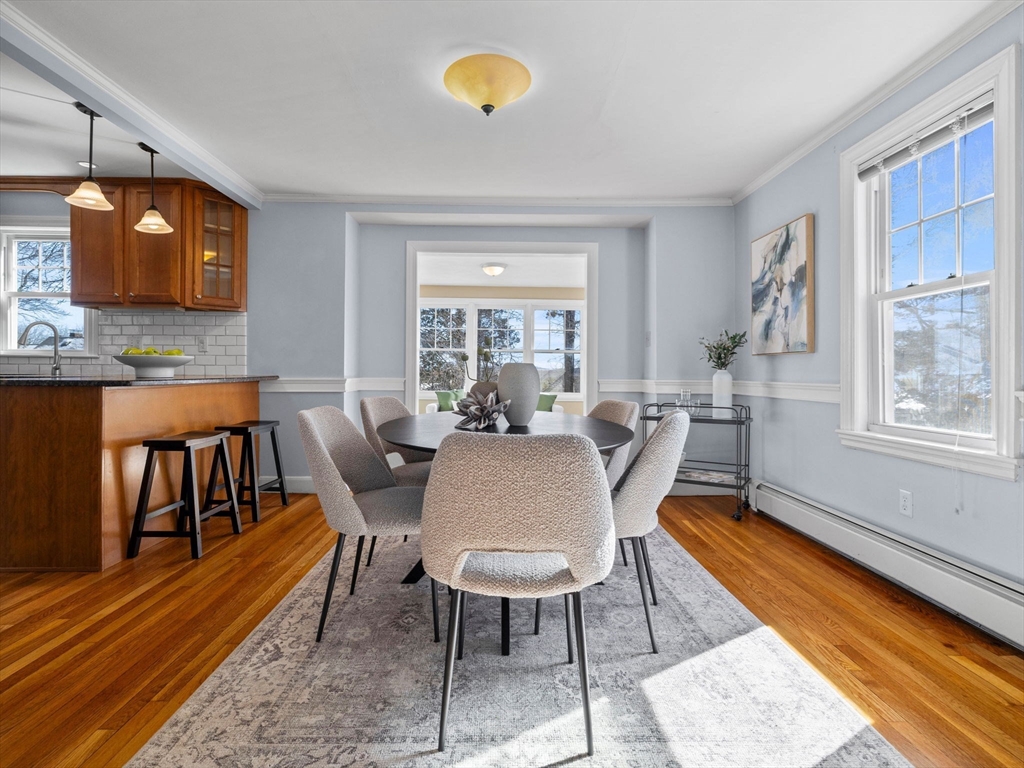 40 Chisholm Road Boston, MA 02131 - Photo 7 of 33 a view of a dining room with furniture window and wooden floor