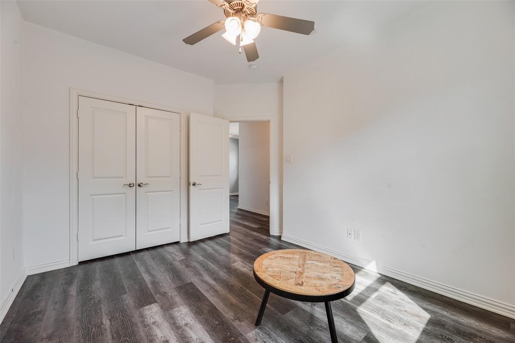 4670 I Rhett Lane, Unit I Carrollton, TX 75010 - Photo 28 of 31 Recessed lighting, ceiling fan with light fixture, wood-finish flooring, white walls, and white paneled doors