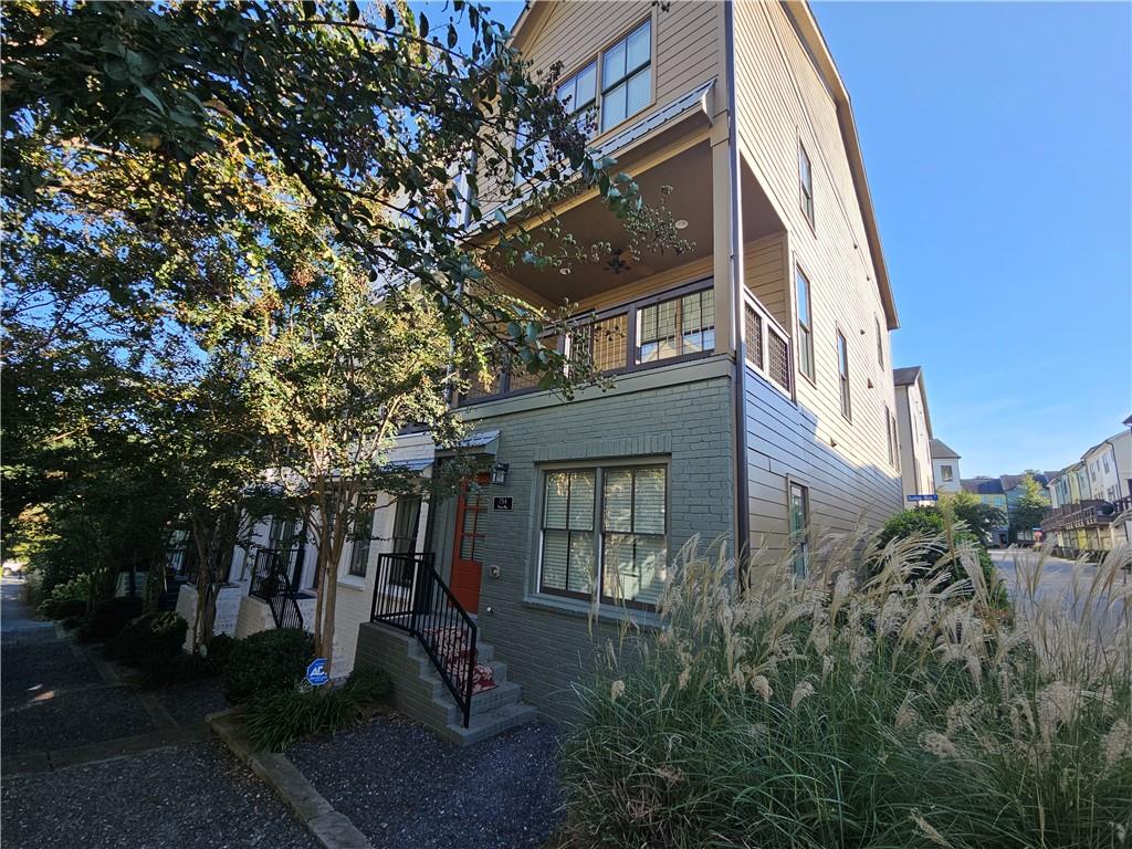 a view of a building with a yard