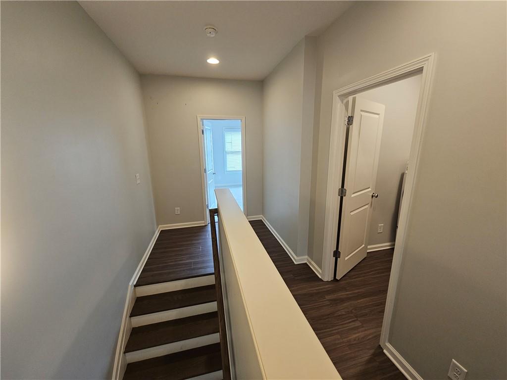 754 Dunlop Way Atlanta, GA 30312 - Photo 11 of 33 a view of a hallway with wooden floor and staircase