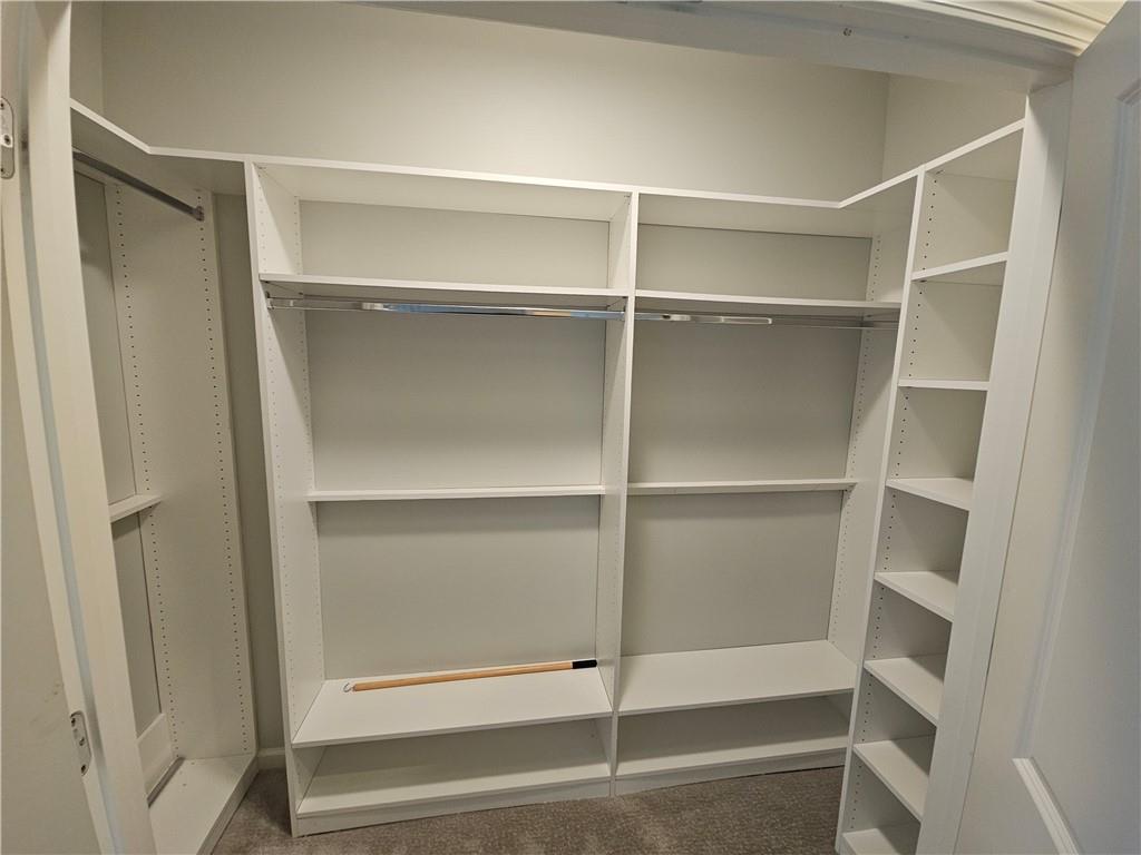 754 Dunlop Way Atlanta, GA 30312 - Photo 16 of 33 a view of walk in closet with empty racks