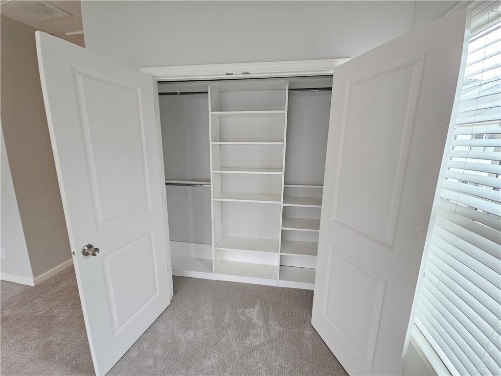 754 Dunlop Way Atlanta, GA 30312 - Photo 22 of 33 a view of closet area with empty racks