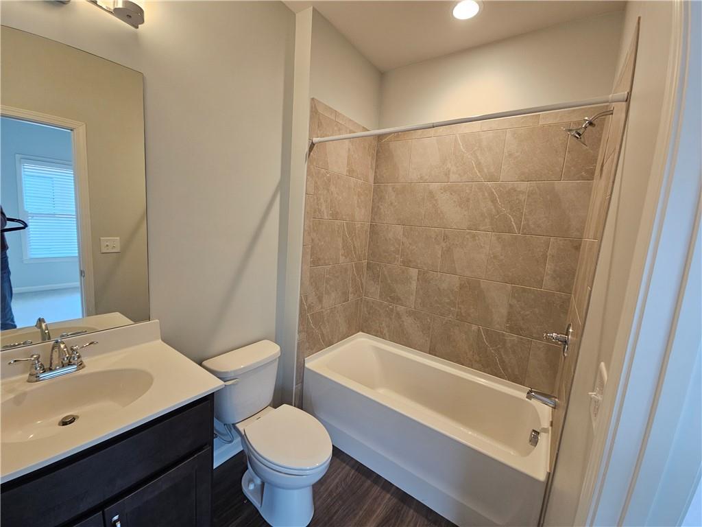 754 Dunlop Way Atlanta, GA 30312 - Photo 25 of 33 a bathroom with a sink and a mirror