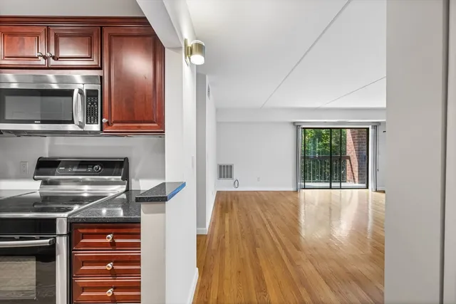 a kitchen with a stove and a microwave