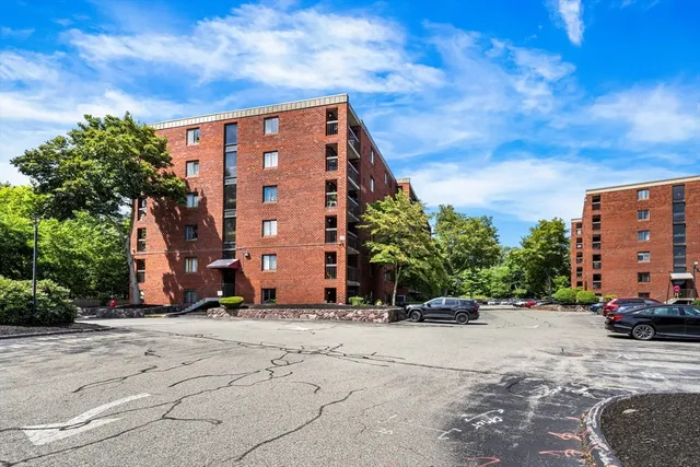 a view of car parked in front of building