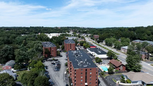 an aerial view of a city with lots of residential buildings