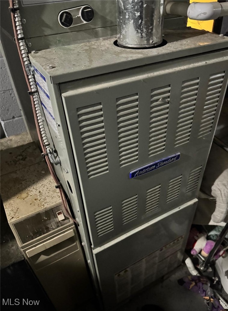 5164 Edenhurst Road Cleveland, OH 44124 - Photo 14 of 15 Basement view of heating unit