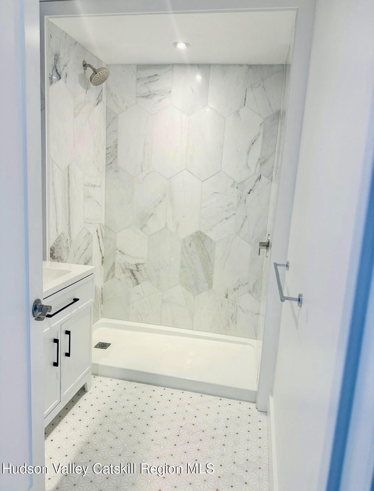 412 Main Street, Unit 3 Catskill, NY 12414 - Photo 11 of 16 a bathroom with a shower