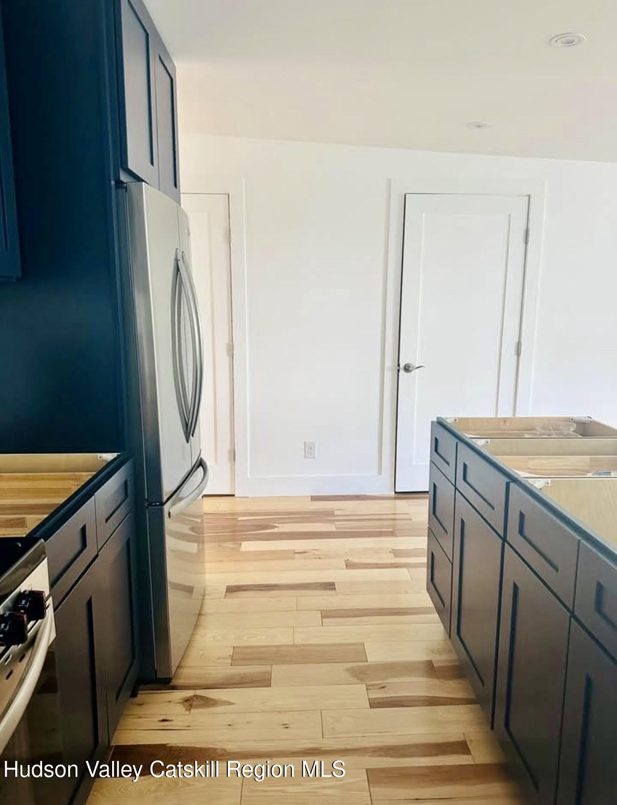412 Main Street, Unit 3 Catskill, NY 12414 - Photo 7 of 16 a bathroom with a sink and a mirror