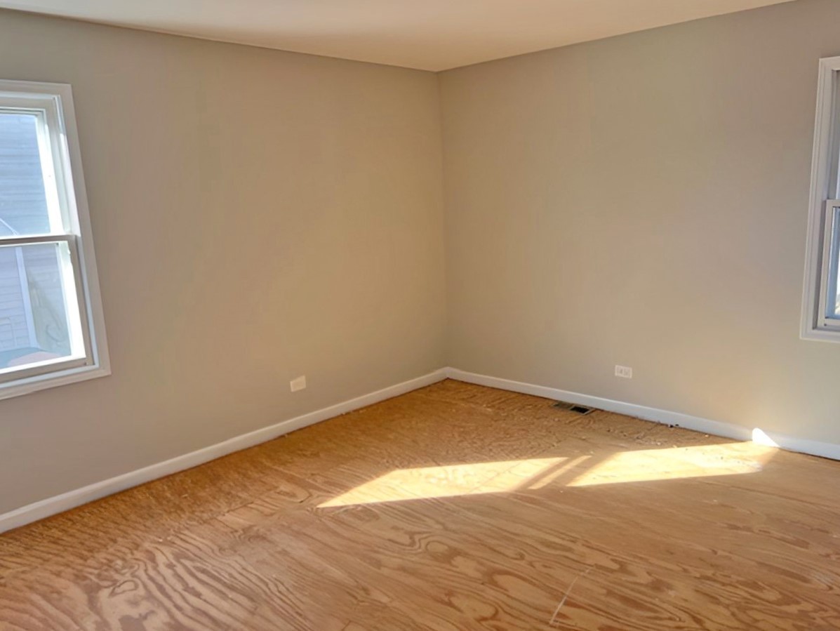 654 Longview Drive Antioch, IL 60002 - Photo 22 of 39 wooden floor in an empty room