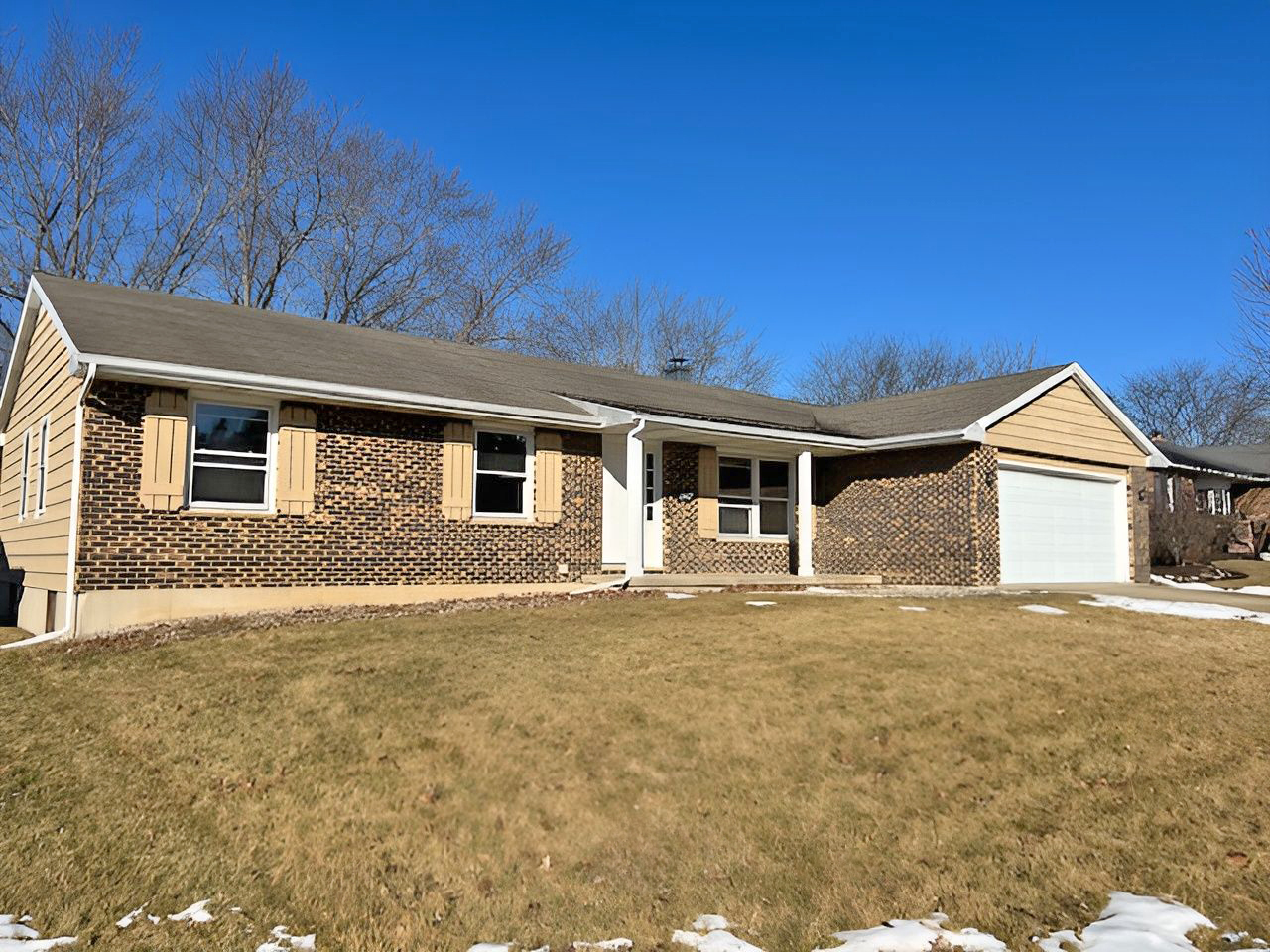 654 Longview Drive Antioch, IL 60002 - Photo 3 of 39 a front view of a house with a yard