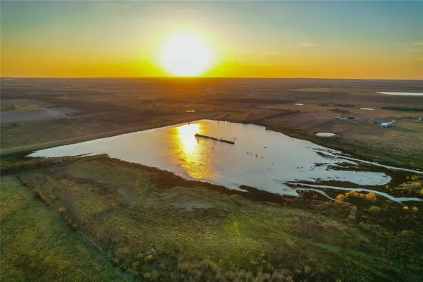 an aerial view of beach and ocean