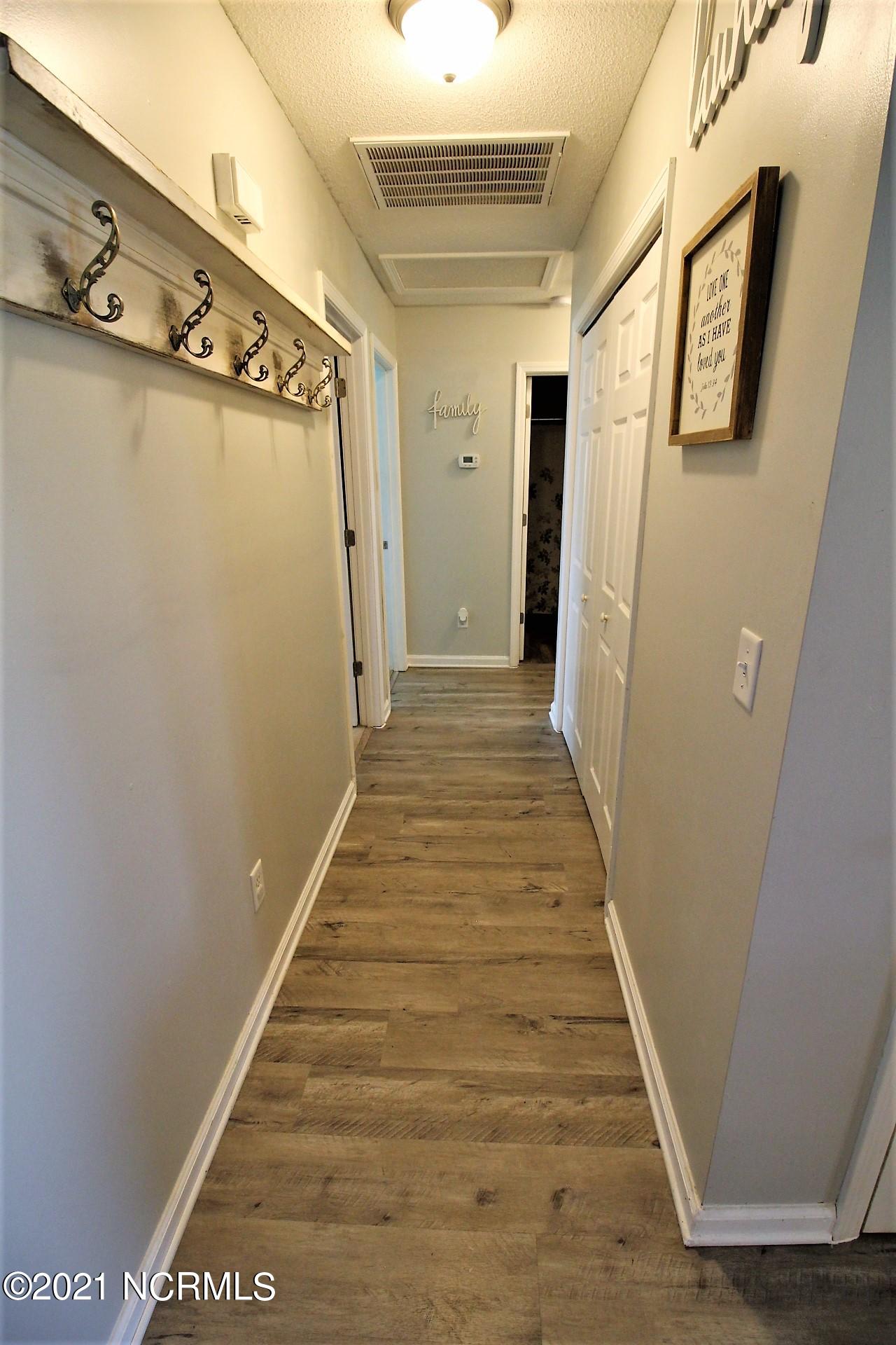 594 Godette School Road Havelock, NC 28532 - Photo 16 of 37 Bedroom wing hallway