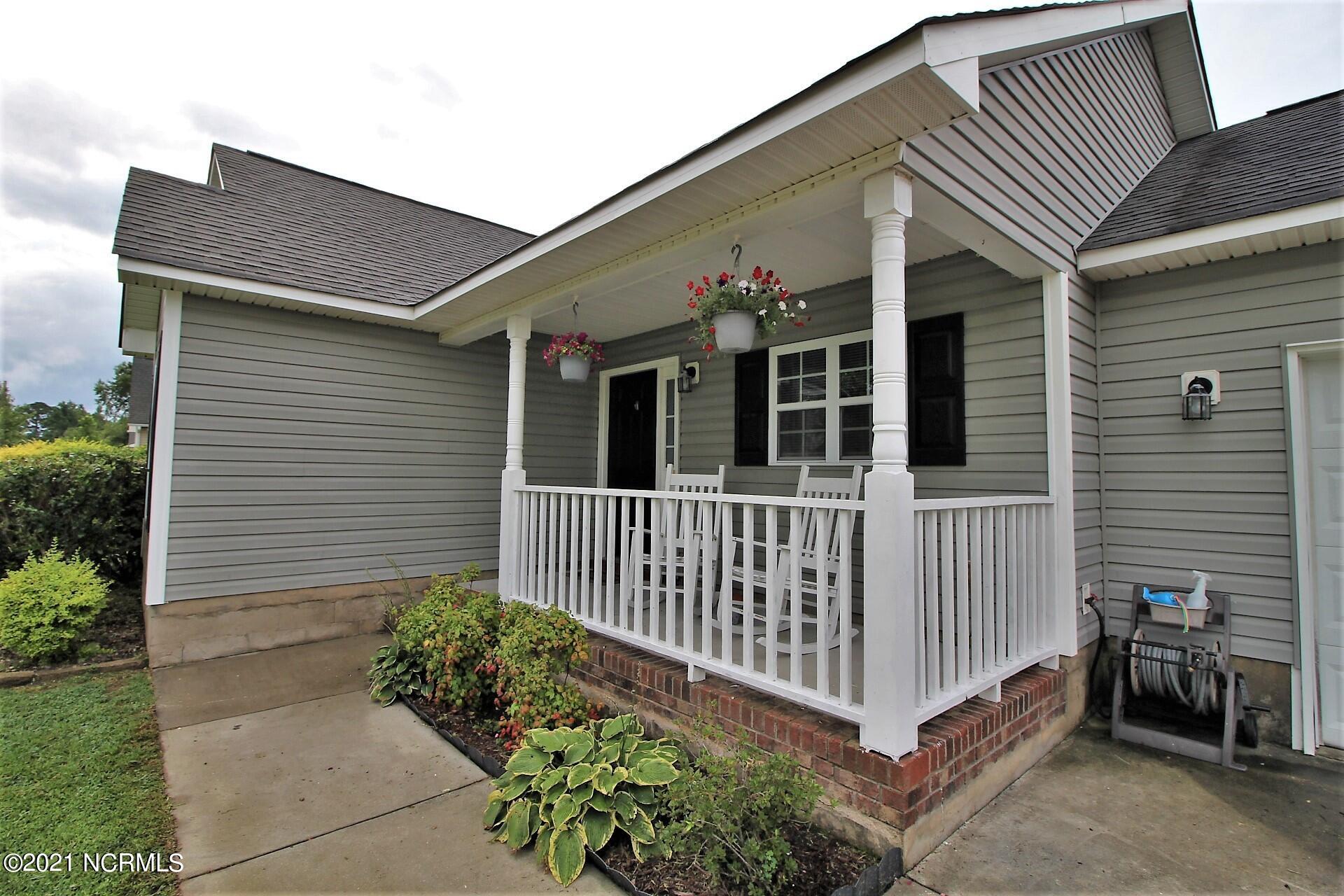 594 Godette School Road Havelock, NC 28532 - Photo 3 of 37 Cover front porch - perfect for 2 rockers!