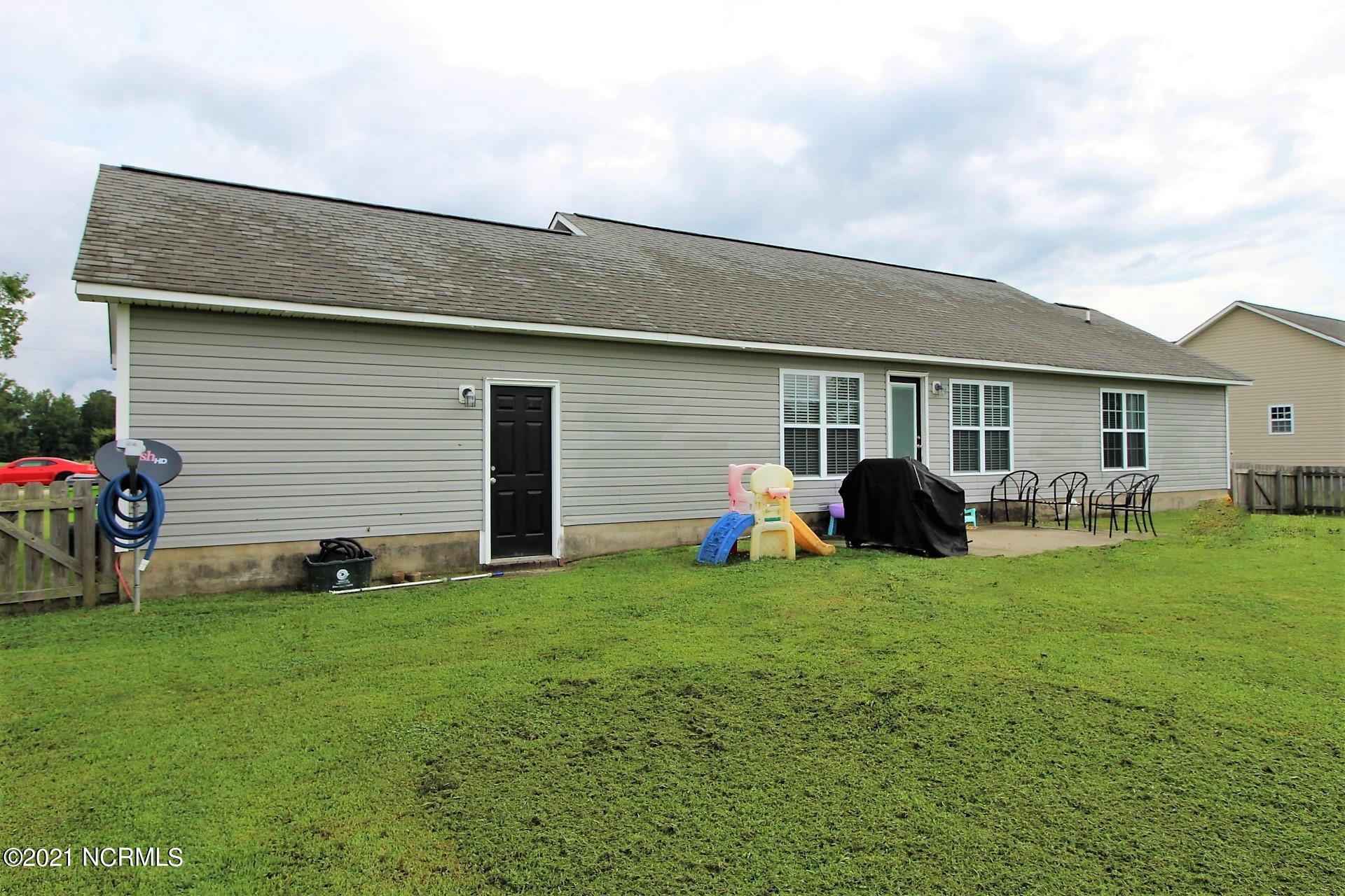 594 Godette School Road Havelock, NC 28532 - Photo 35 of 37 Rear exterior with patio