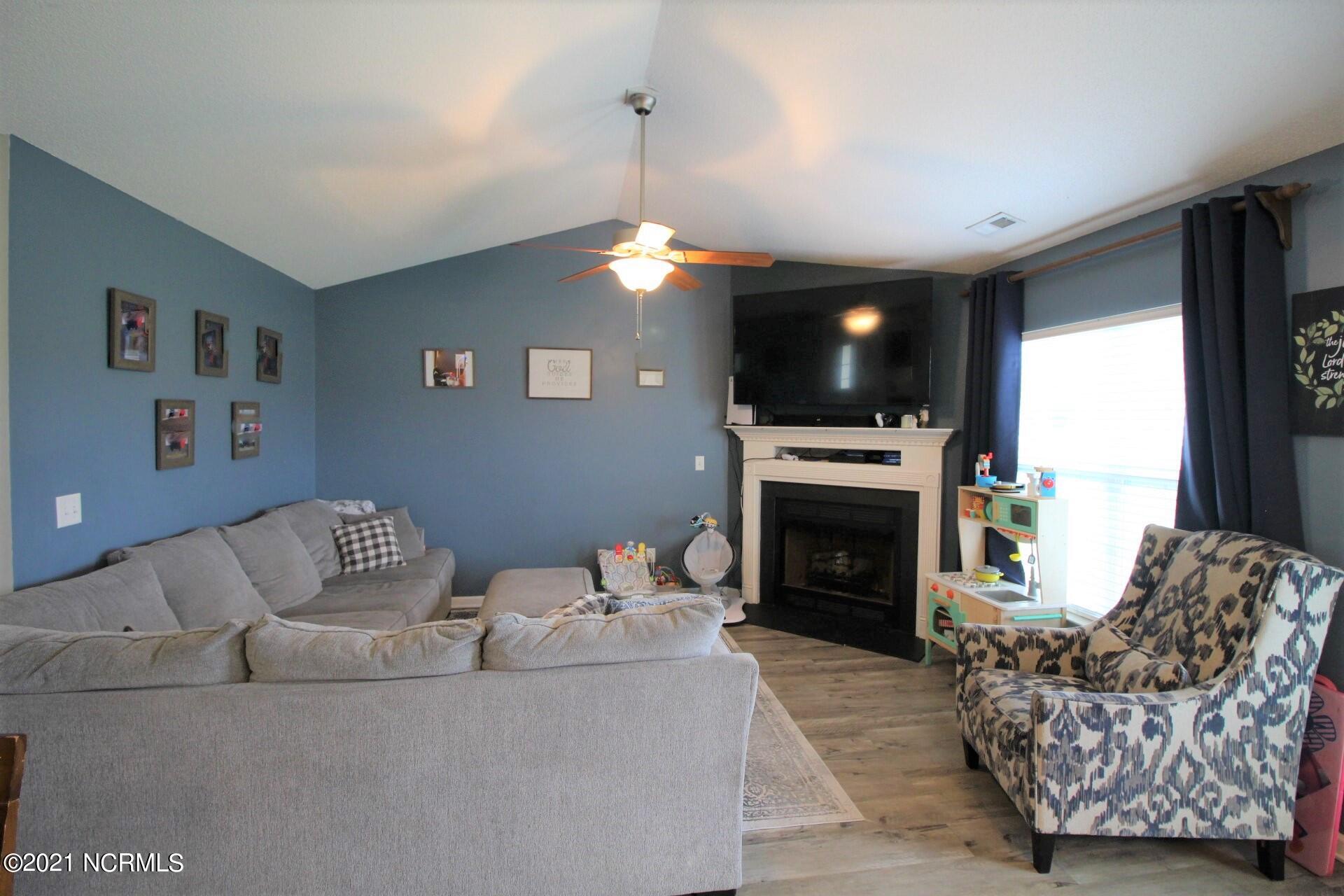 594 Godette School Road Havelock, NC 28532 - Photo 6 of 37 Gas fireplace, bright large windows