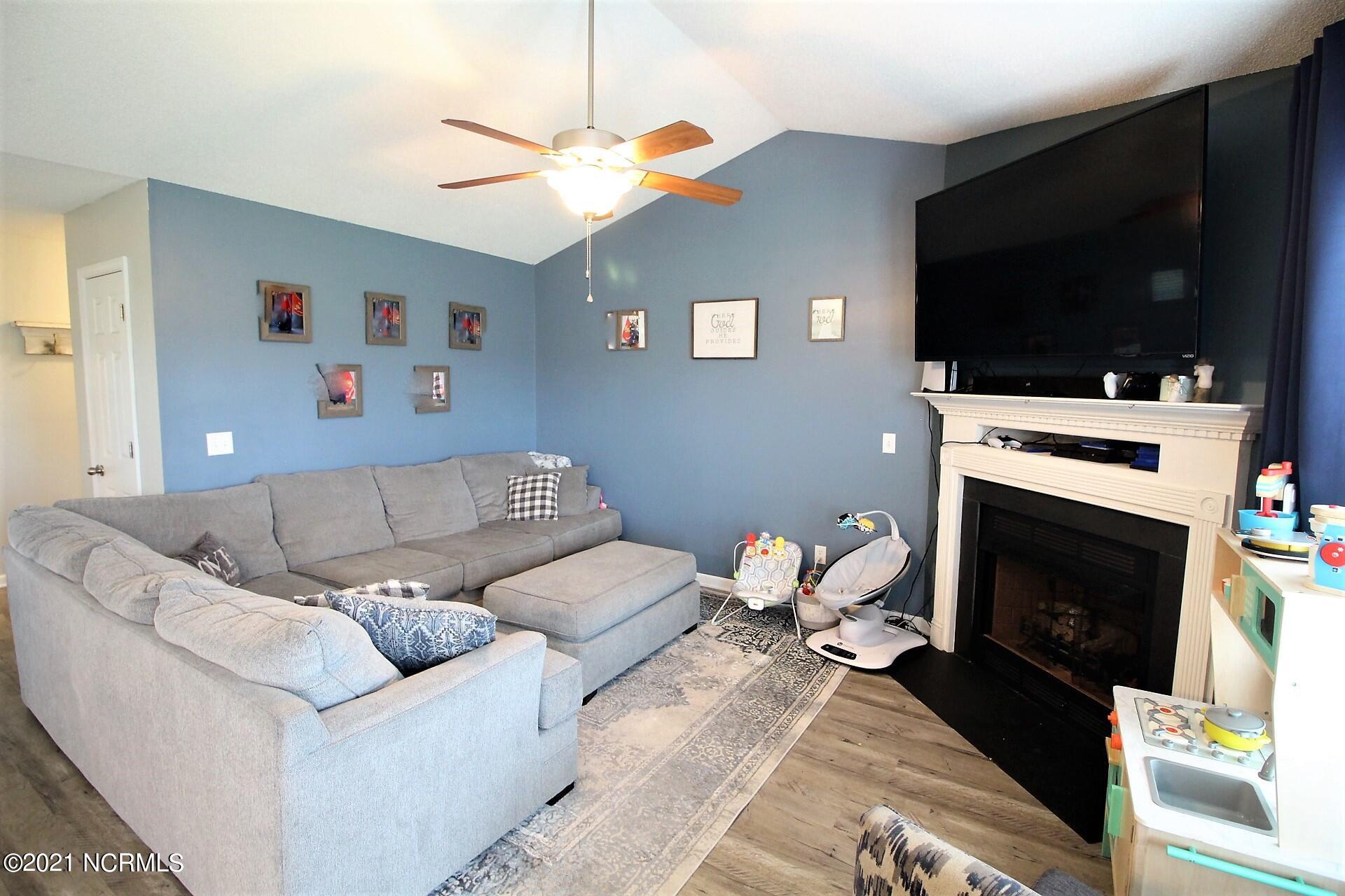 594 Godette School Road Havelock, NC 28532 - Photo 7 of 37 New vinyl flooring thru out main living areas. Vaulted ceiling, ceiling fans!