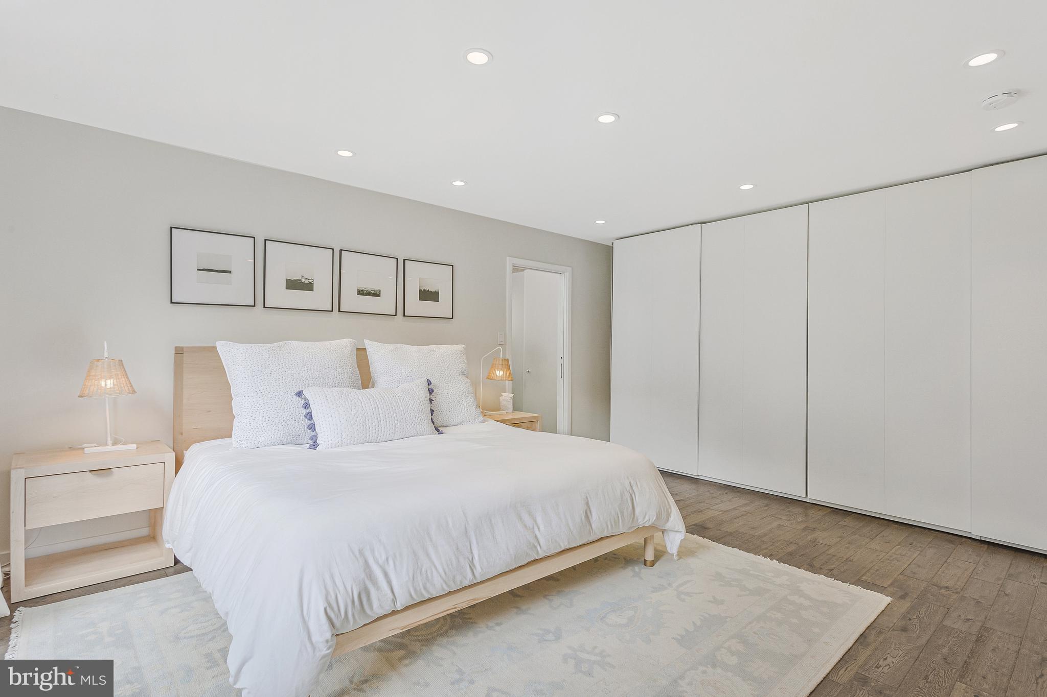 718 Springvale Road Great Falls, VA 22066 - Photo 21 of 57 a bedroom with a large bed