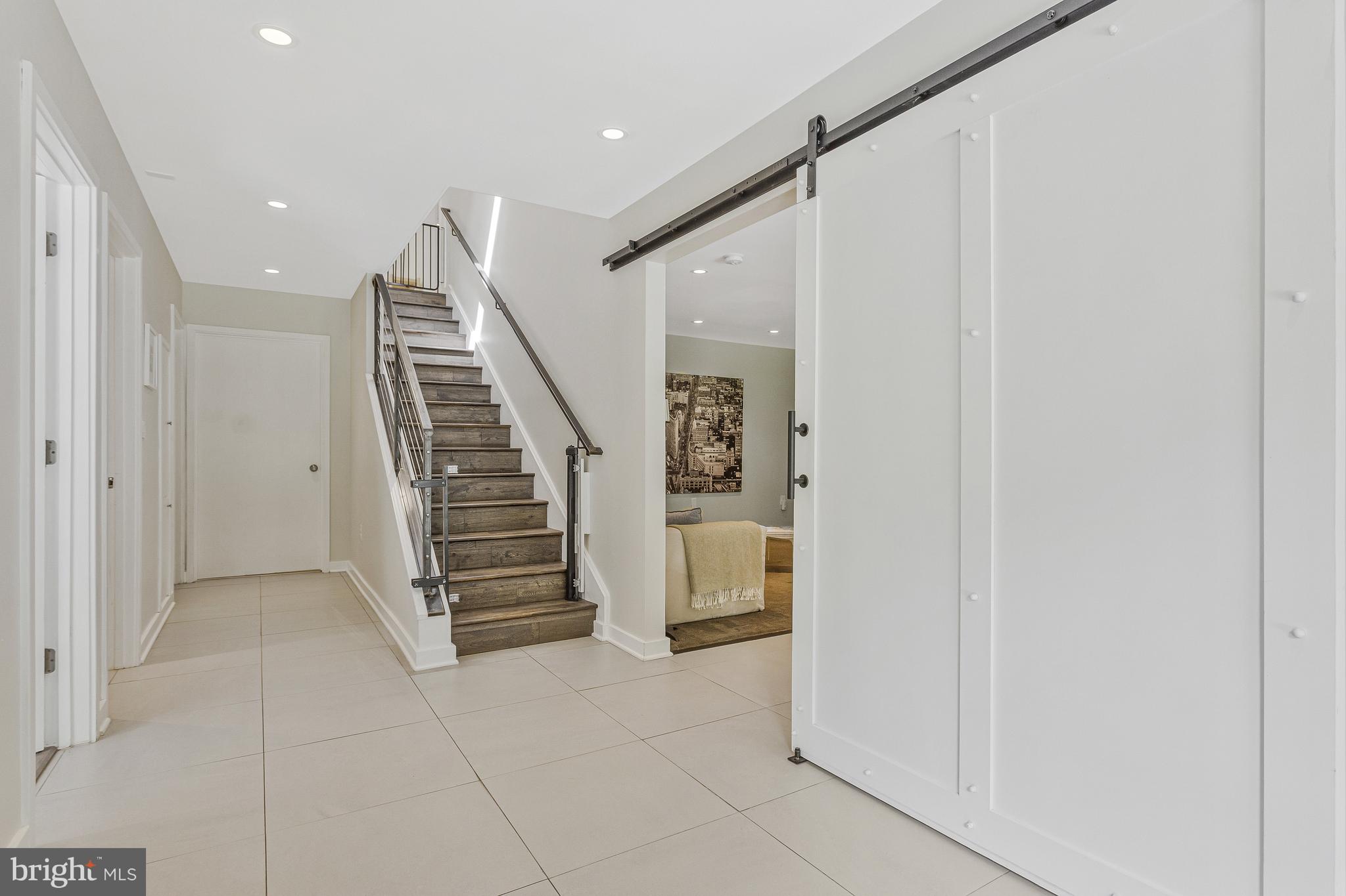 718 Springvale Road Great Falls, VA 22066 - Photo 30 of 57 a view of hallway with stairs and stairs