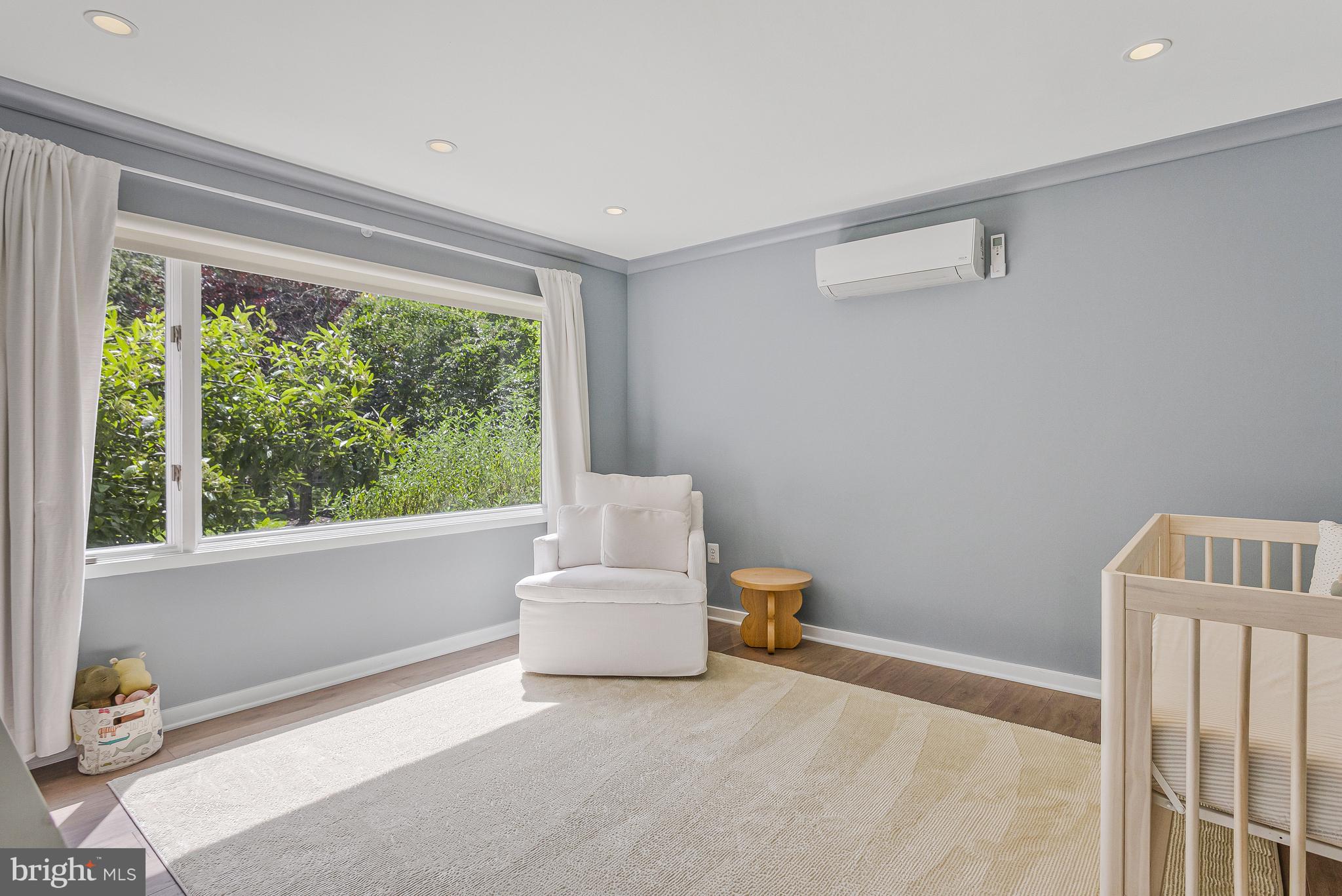 718 Springvale Road Great Falls, VA 22066 - Photo 31 of 57 a living room with furniture and a window