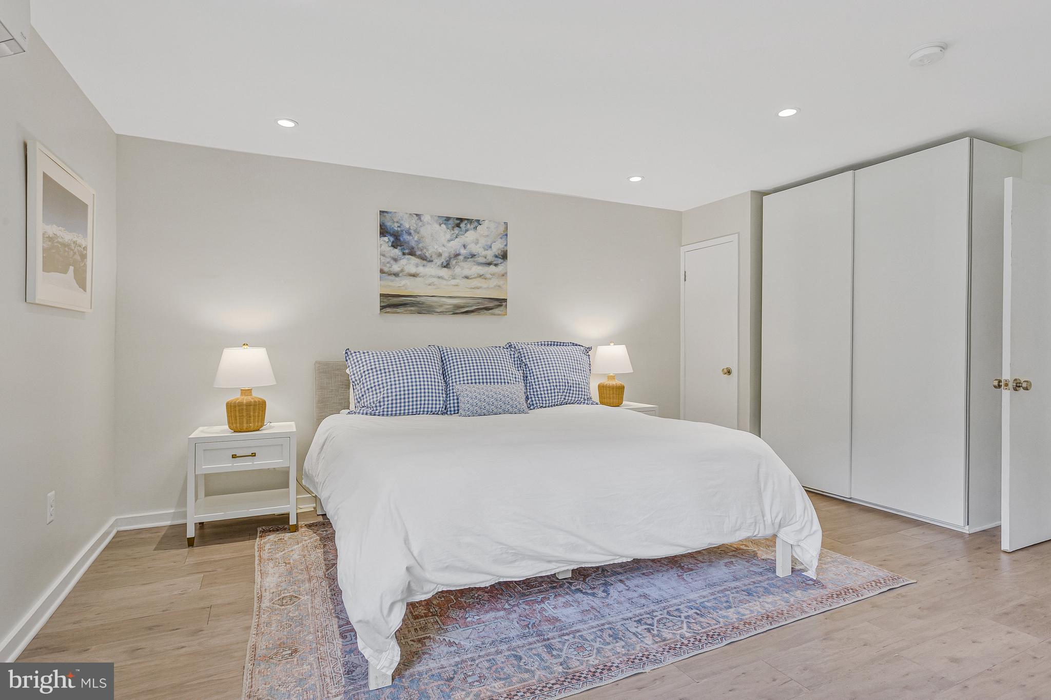 718 Springvale Road Great Falls, VA 22066 - Photo 35 of 57 a spacious bedroom with a bed and window