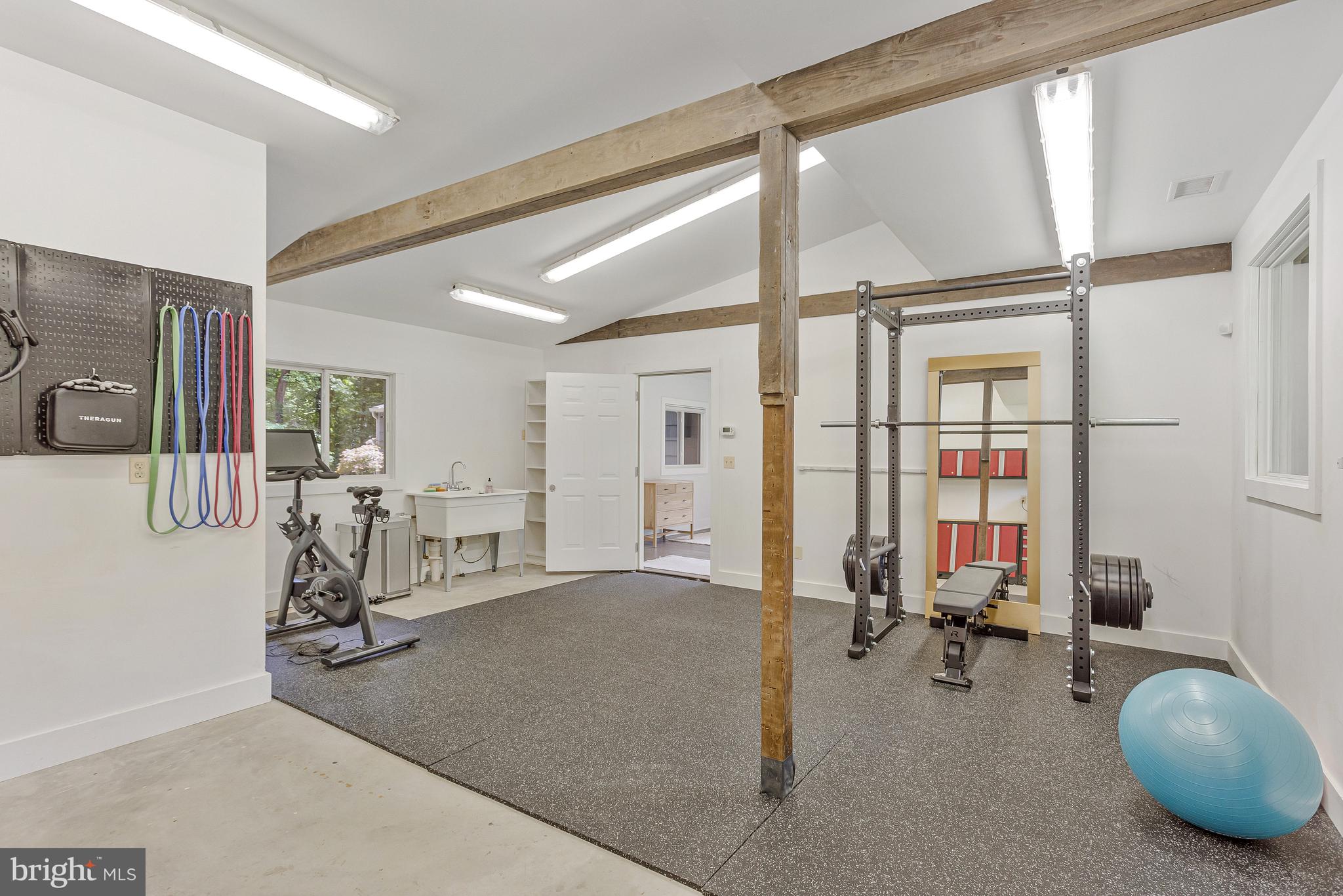 718 Springvale Road Great Falls, VA 22066 - Photo 41 of 57 a view of a room with gym equipment