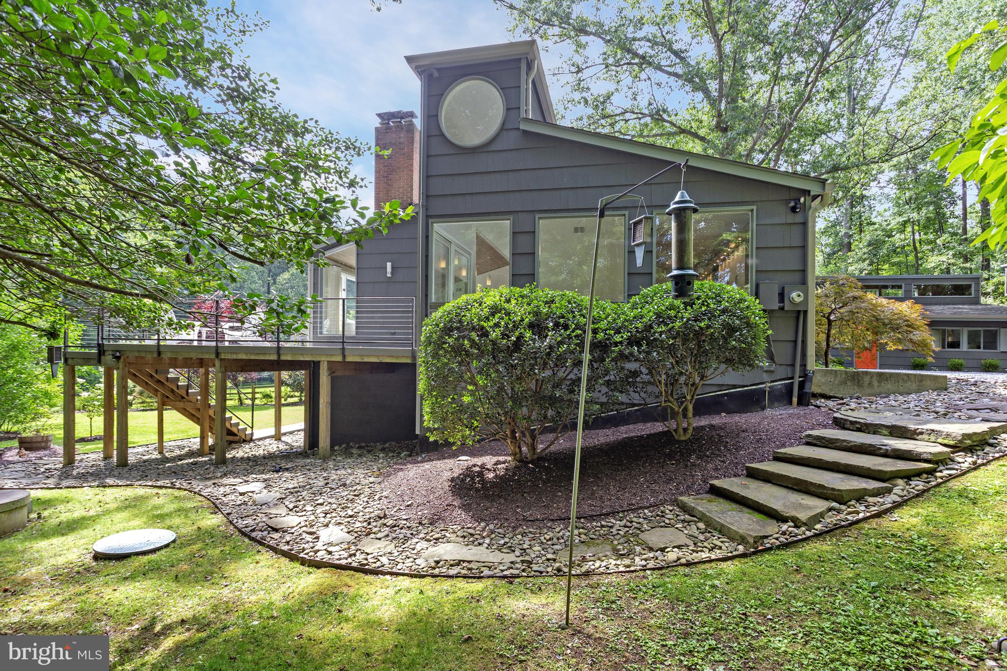 718 Springvale Road Great Falls, VA 22066 - Photo 42 of 57 a front view of a house with entertaining space