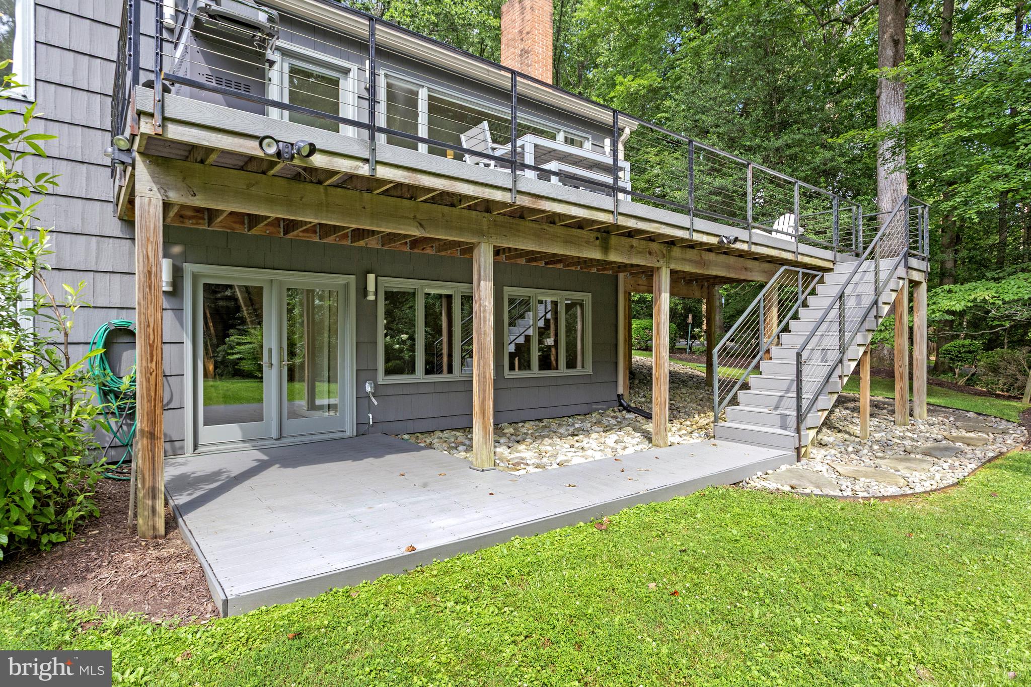 718 Springvale Road Great Falls, VA 22066 - Photo 46 of 57 a view of a house with backyard porch and sitting area