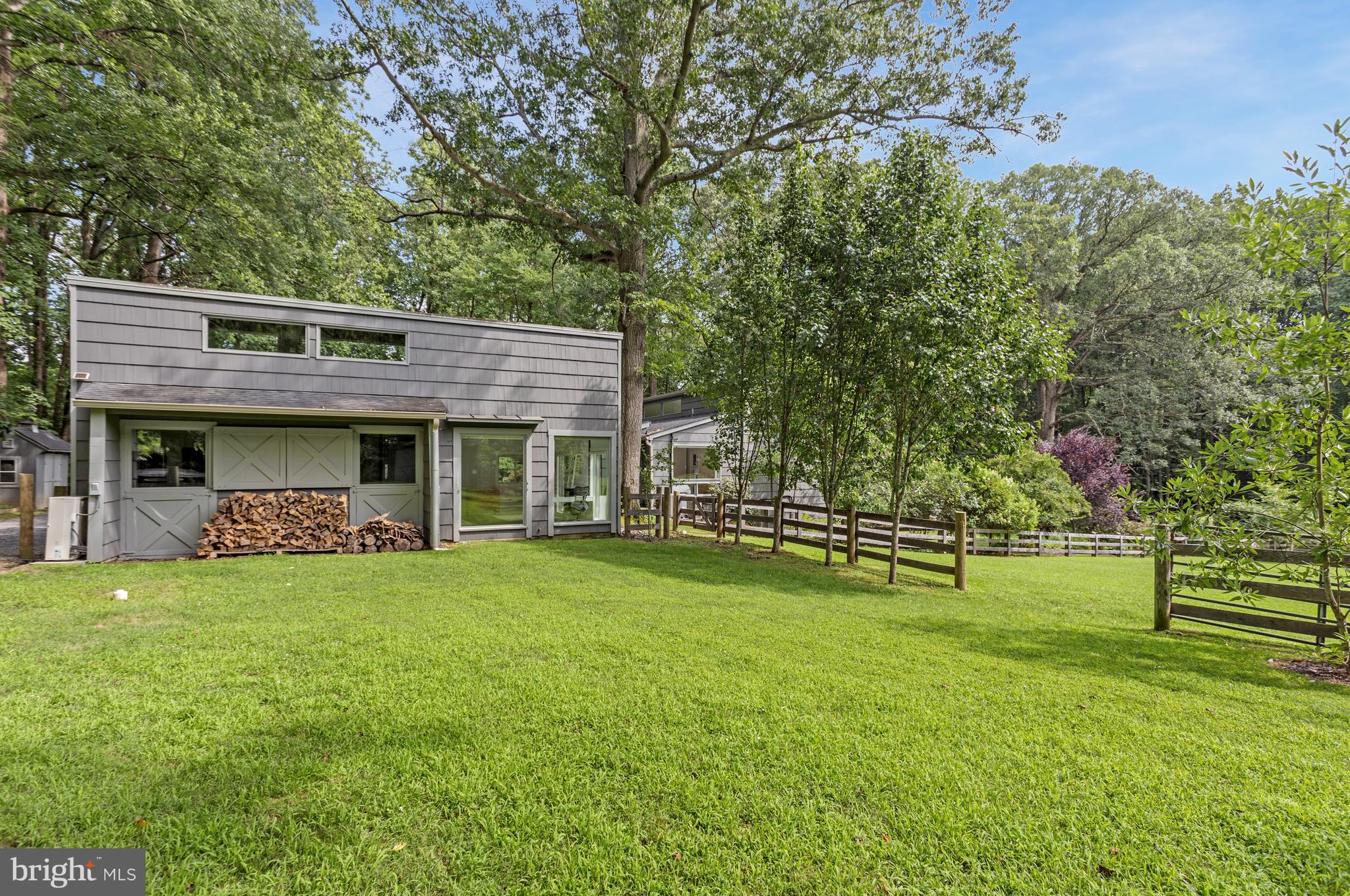 718 Springvale Road Great Falls, VA 22066 - Photo 52 of 57 a view of a house with a yard